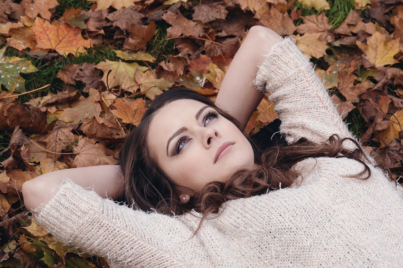 Woman, brunette, lying down — Payment Limits and Withdrawal Times at WinoMania Casino
